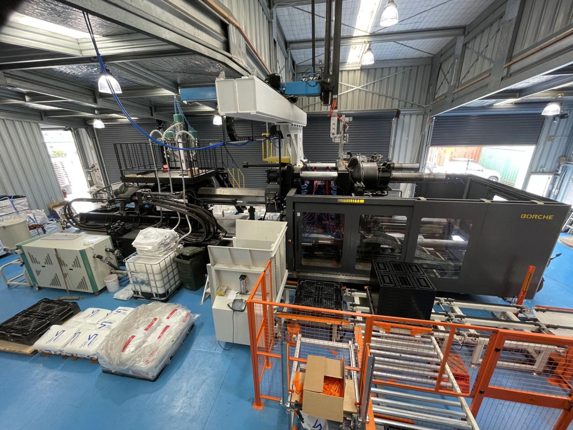 Injection moulding machinery on the Workdek factory floor in New Zealand
